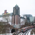 tortue hamburg - Snow-covered Hamburg with urban architecture and train in winter scene.